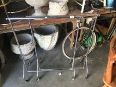 2 metal clothes rails.