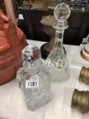 2 crystal decanters with 3 porcelain labels.