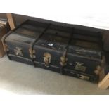 A large old trunk with inner tray.