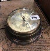 A brass ships style barometer.