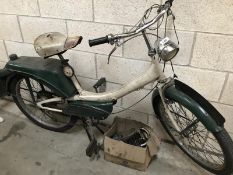 A 1966 Raleigh runabout moped (no documents).