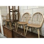5 pine kitchen chairs including 2 carvers and a bar stool.