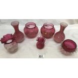 A mixed lot of cranberry glass including bird decorated pots and a pair of pink glass vases.