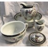 An imperial porcelain jug, basin, chamber pot, soap dish and toothbrush jar.