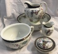 An imperial porcelain jug, basin, chamber pot, soap dish and toothbrush jar.