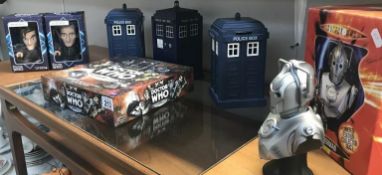 A Dr Who limited edition Cyberman bust, 2 Titan figures, 2 Tardis money boxes,