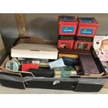 A box of miscellaneous items including boxed sparklets, soda syphons, wooden train etc.