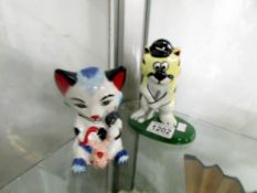 A Lorna Bailey cat with mouse (a/f) and a Lorna Bailey golfing cat.