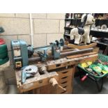 A Clarke 37" wood turning lathe.