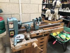 A Clarke 37" wood turning lathe.