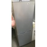 A grey fridge freezer.