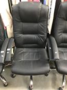 A black leather office chair.