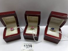 A pink princess cut cubic zirconia gold plated dress ring (size K half),