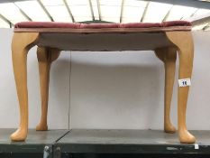 A dressing table stool with Queen Anne legs