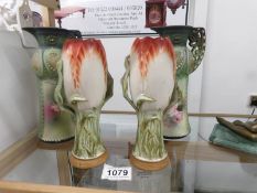 A pair of art nouveau ewer's and a pair of art nouveau vases.
