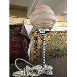 An art deco chrome table lamp with shade.