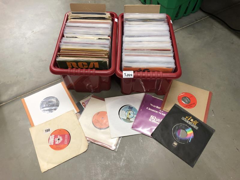 2 boxes of 1970's 45 rpm records.