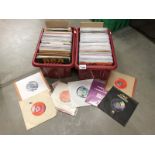 2 boxes of 1970's 45 rpm records.