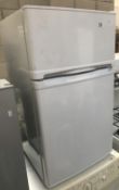 A small fridge freezer.