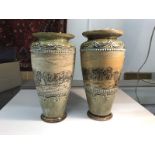 A pair of Royal Doulton vases with sheep by Hannah Barlow with many other marks underneath