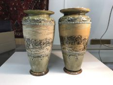 A pair of Royal Doulton vases with sheep by Hannah Barlow with many other marks underneath