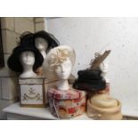 A quantity of vintage hats and boxes (heads not included).