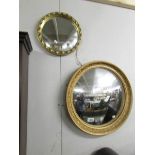 2 circular mirrors, one being concave.