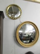2 circular mirrors, one being concave.