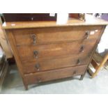 An oak 4 drawer chest.