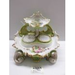 An ornate 19th century porcelain ink stand with inkwell and sprinkler dryer.