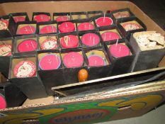 A collection of map printing rolls with holder and ink block.