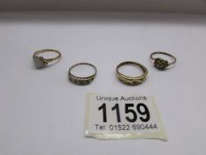 4 gold rings set with various stones, hall marks worn, approximate total weight 8 grams.