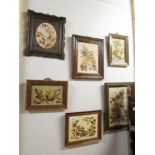 A quantity of Edwardian framed and glazed collages of dried flowers.