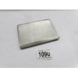 A silver cigarette case, hall marked Birmingham 1941. W.T.Toghill & Co., Approximately 166 grams.