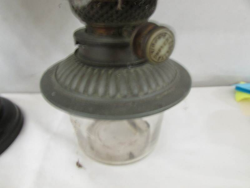 A Victorian Hink's spelter oil lamp in the form of an urn with drop in font and complete with shade - Image 3 of 3