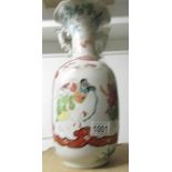 An oriental hand painted vase.