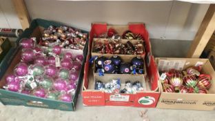 A box of over 140 Christmas tree ornaments and baubles.