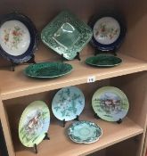 A pair of cattle decorated plates, 2 woods dishes, a french plate and 4 leaf pattern plates.