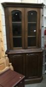 A Victorian mahogany corner cupboard.