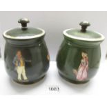 A pair of 19th century T & G pottery Dicken's themed tobacco jars.