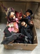 A quantity of witch dolls.