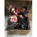 A quantity of witch dolls.