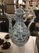 A large blue and white Chinese ewer.