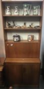 A teak effect wall unit.