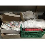 An assortment of linen and other items including table cloths, napkins etc.