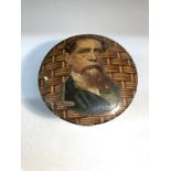 An Edwardian papier mache' string box with portrait on lid.