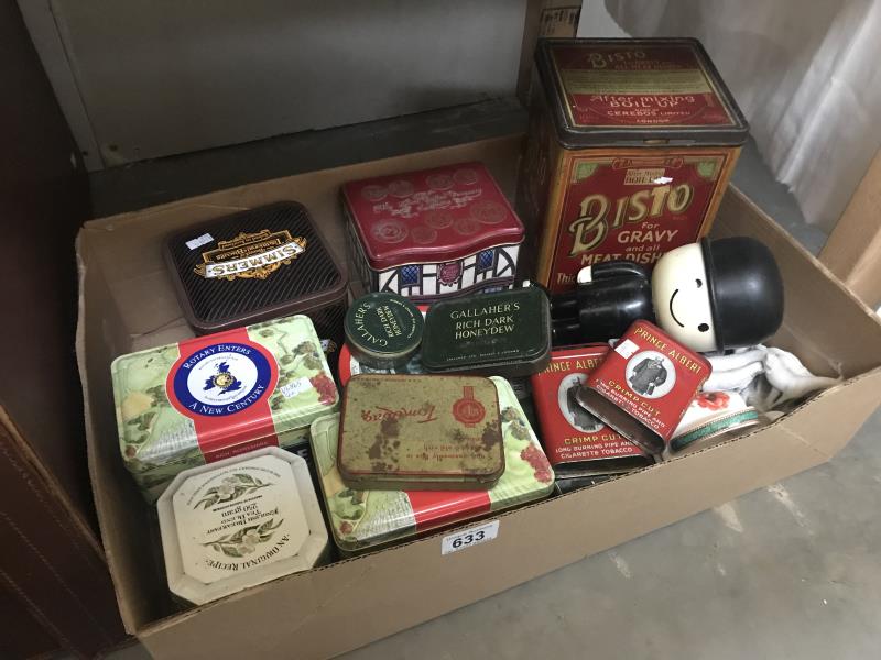 A quantity of vintage tins etc.