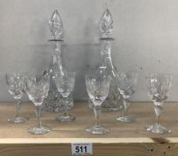 A pair of cut glass decanters and 6 glasses.