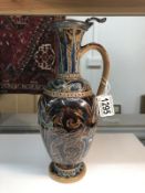 A Doulton Lambeth jug with abstract design in blue and brown, 1874, by Arthur Barlow,
