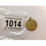 A George III gold guinea as a pendant (9 grams).